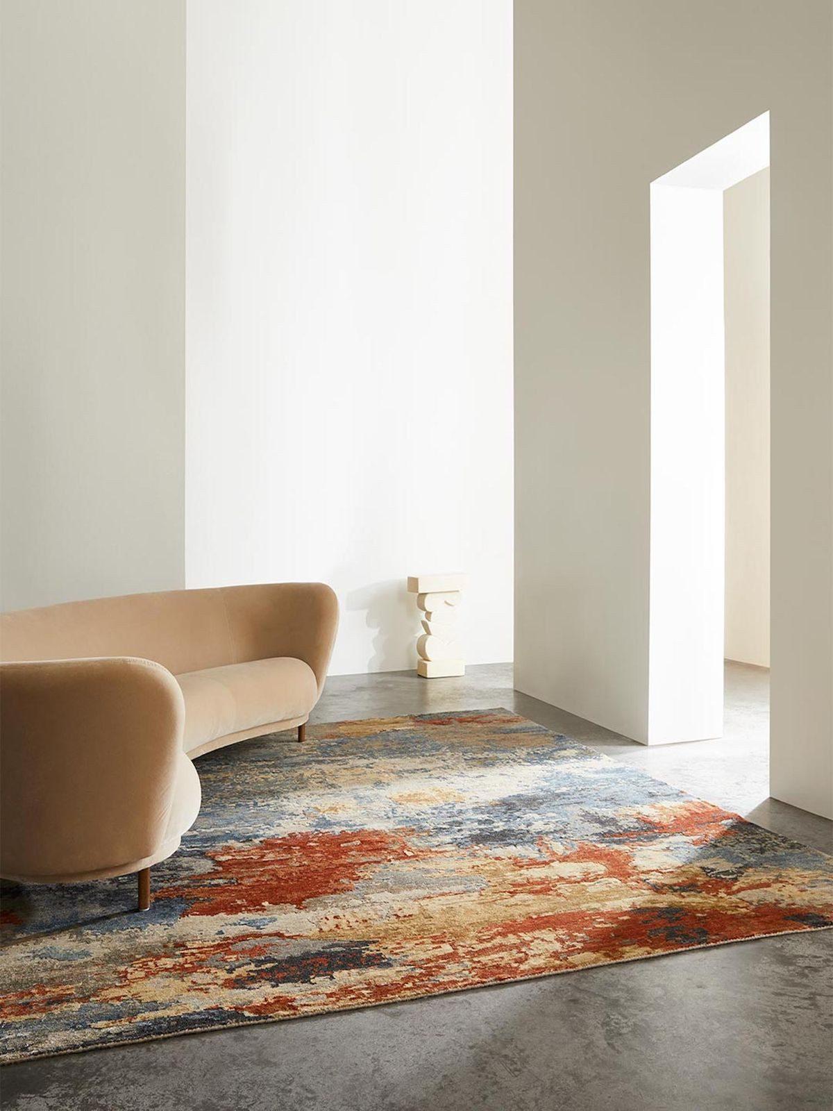 A finished hand-knotted rug in an abstract multicolor pattern