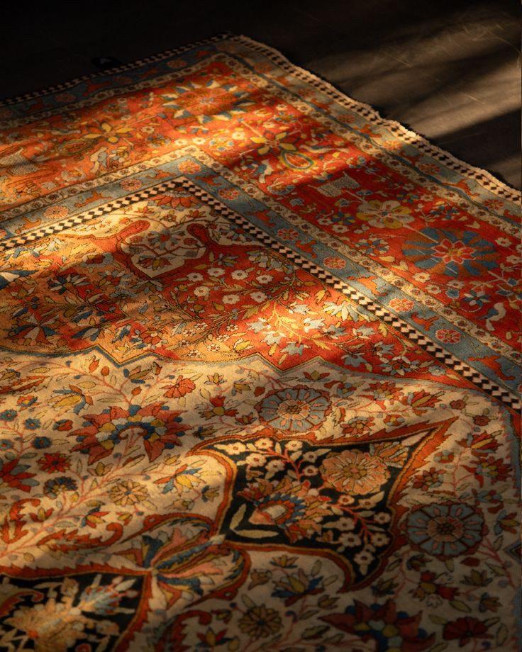 Macro detail of an antique-style hand-knotted rug